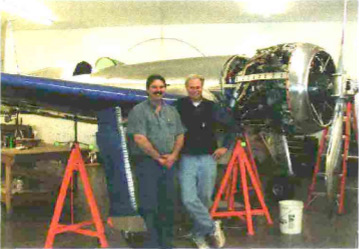 Ron Englund, left, project manager for the H-1, and the author in a recent photo of the Hughes racer